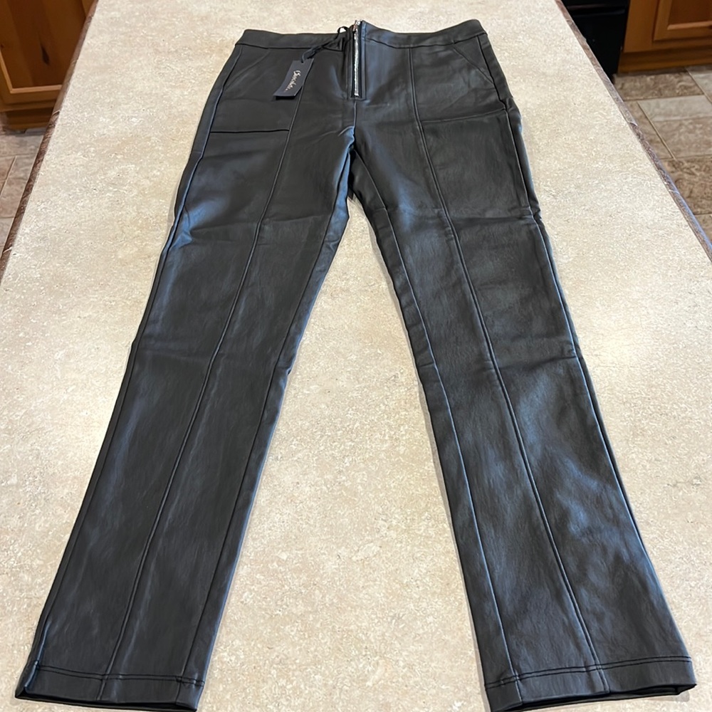 Leather pants.